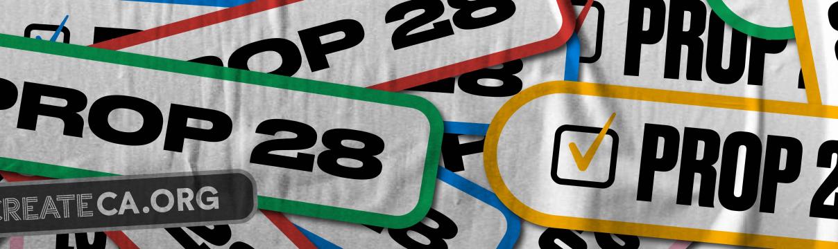 pile of Prop 28 stickers