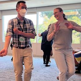 adults dancing at meeting